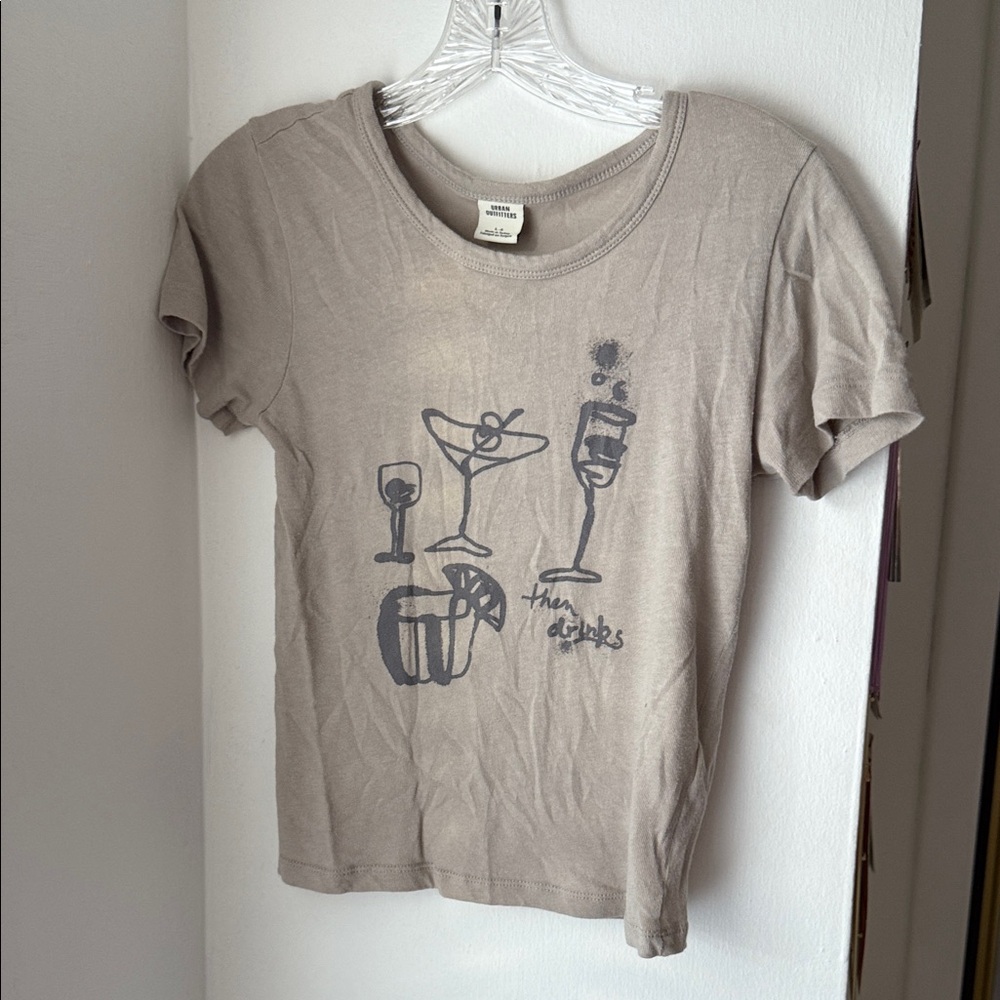Urban Outfitters then drinks Graphic Baby Tee